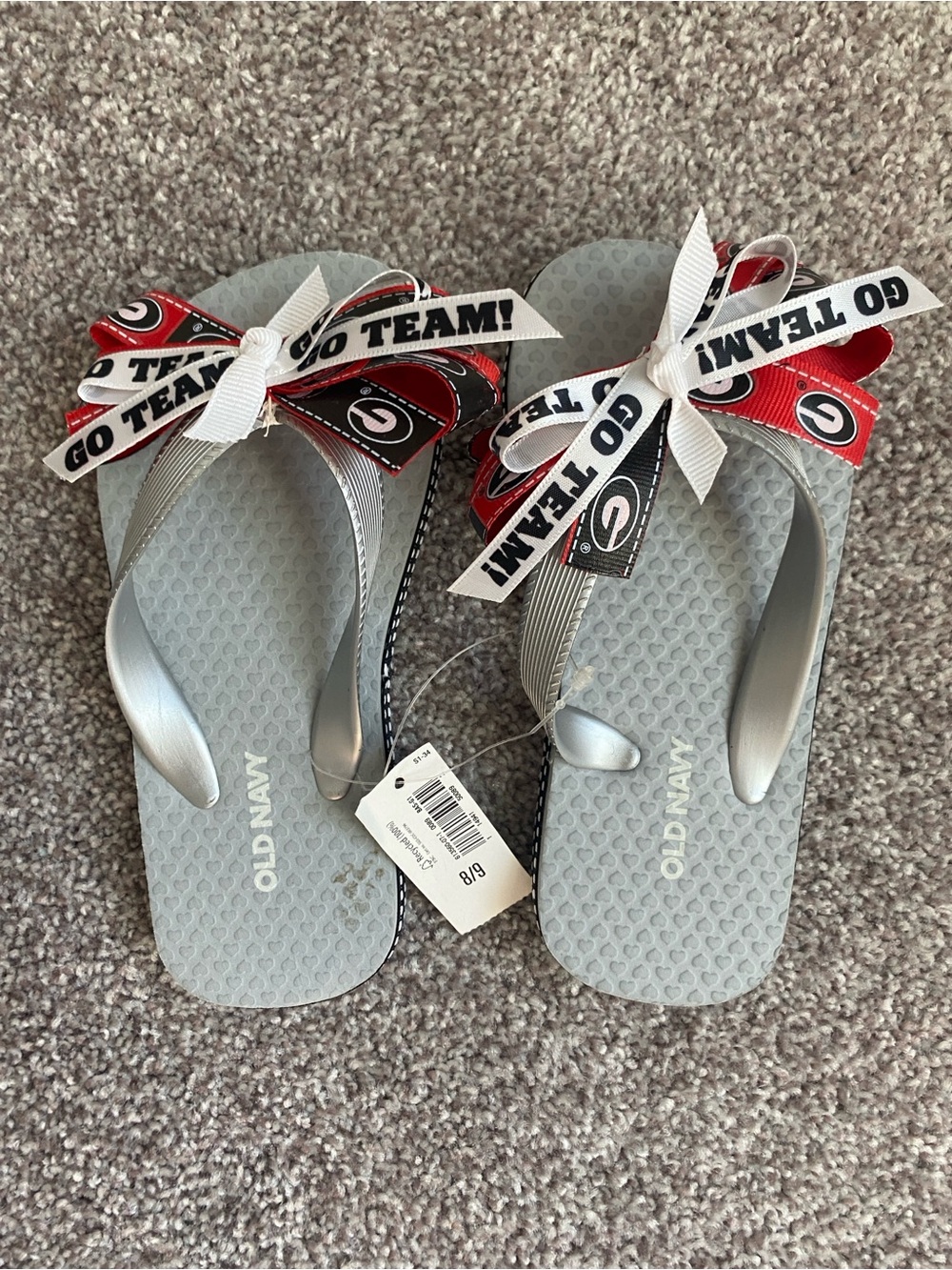 NWT Old Navy Child’s Gray Flip Flops with UGA Team Ribbon Bows Size 8/9